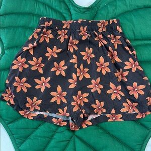Lokahi Swimwear brown orchid floral shorts. Size XS. Double pockets.